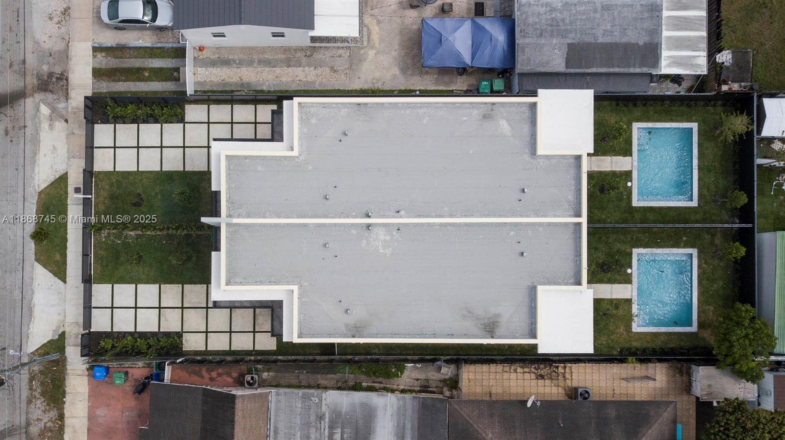 3430 Southwest 2nd Street Miami, FL 33135 - Photo 35 of 38 front view of a house with a street