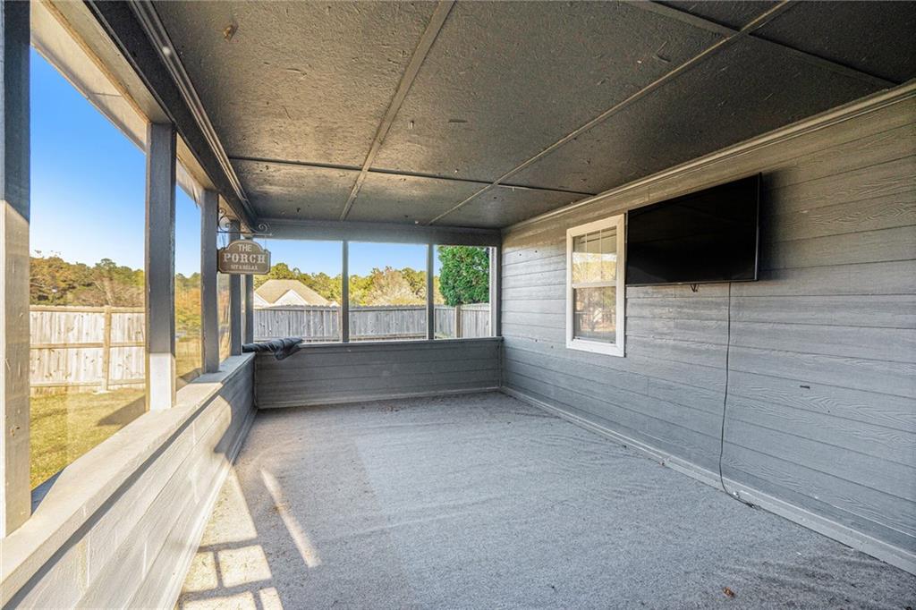 2000 Sage Court Loganville, GA 30052 - Photo 32 of 35 a view of hallway with stairs and furniture