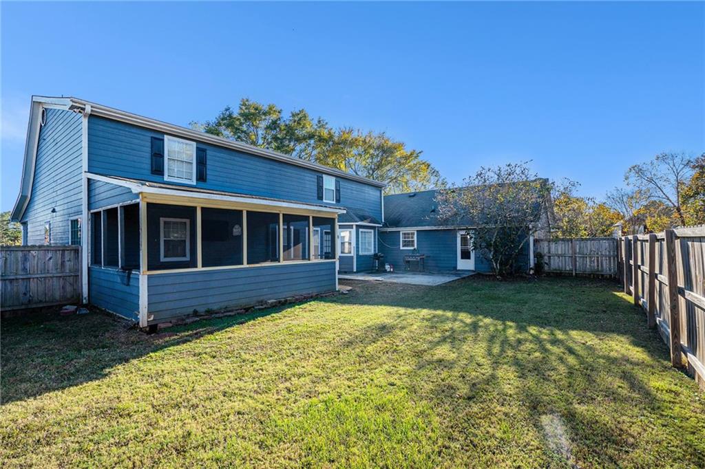 2000 Sage Court Loganville, GA 30052 - Photo 33 of 35 a view of house with yard and entertaining space