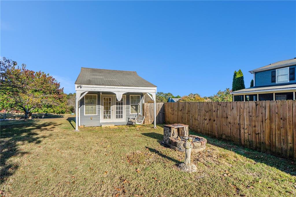 2000 Sage Court Loganville, GA 30052 - Photo 34 of 35 a view of a house with a yard