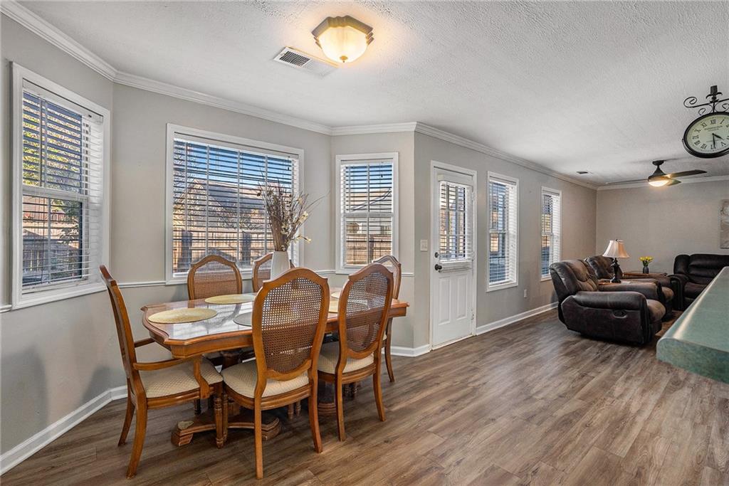 2000 Sage Court Loganville, GA 30052 - Photo 4 of 35 a dining room with furniture and wooden floor