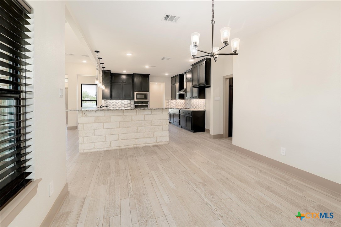 2892 Beulah Boulevard Belton, TX 76513 - Photo 12 of 39 a view of kitchen with sink and refrigerator