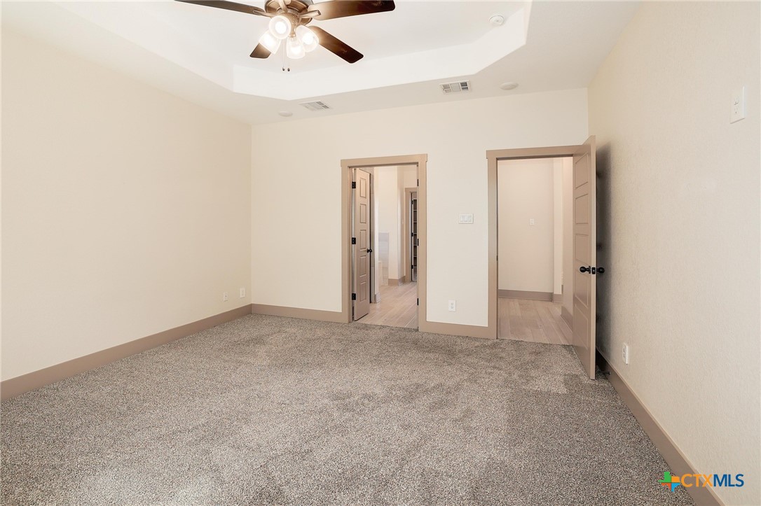 2892 Beulah Boulevard Belton, TX 76513 - Photo 16 of 39 an empty room with chandelier fan