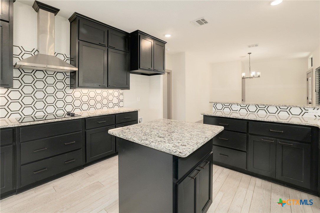 2892 Beulah Boulevard Belton, TX 76513 - Photo 5 of 39 a kitchen with a sink a counter space and cabinets