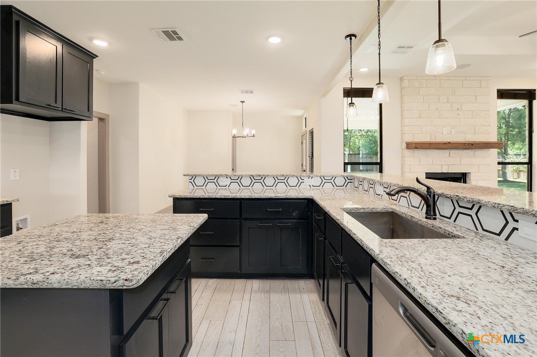 2892 Beulah Boulevard Belton, TX 76513 - Photo 6 of 39 Kitchen Sink open to living room