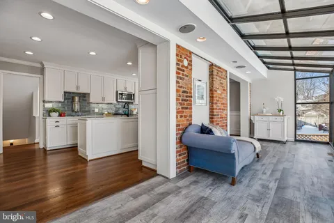 a view of a livingroom with furniture and wooden floor