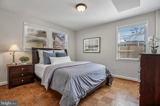 a view of a house with a snow in the yard