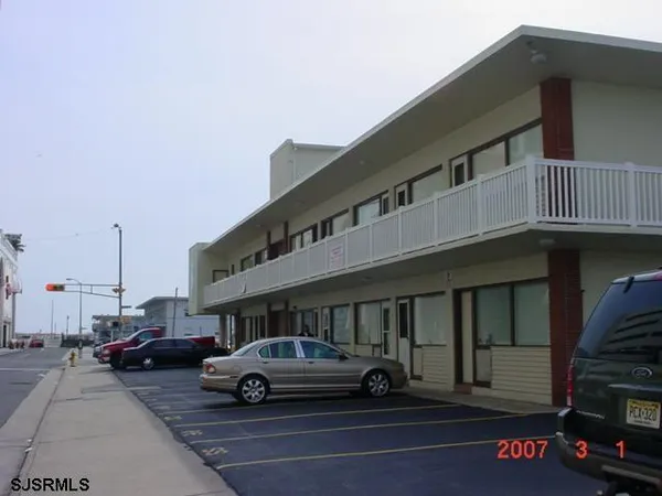 a car parked in front of a building