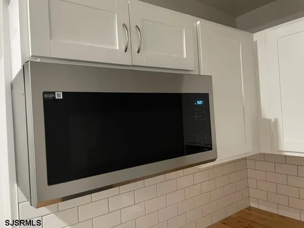 a bathroom with a mirror