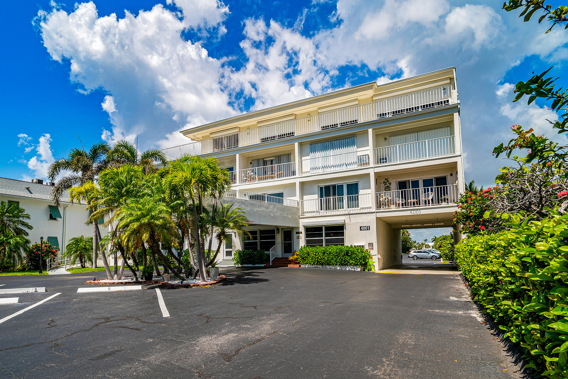 4001 South Ocean Boulevard, Unit 115 South Palm Beach, FL 33480 - Photo 19 of 25 a front view of a building