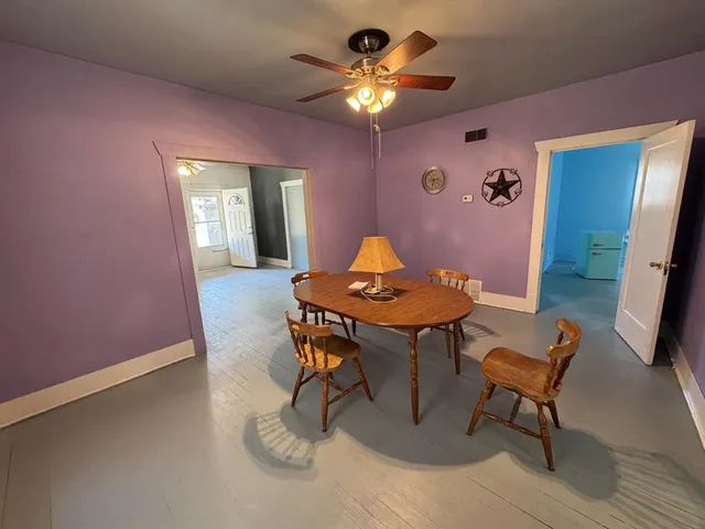 a workspace with furniture and window