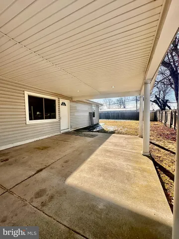 a view of a backyard of the house