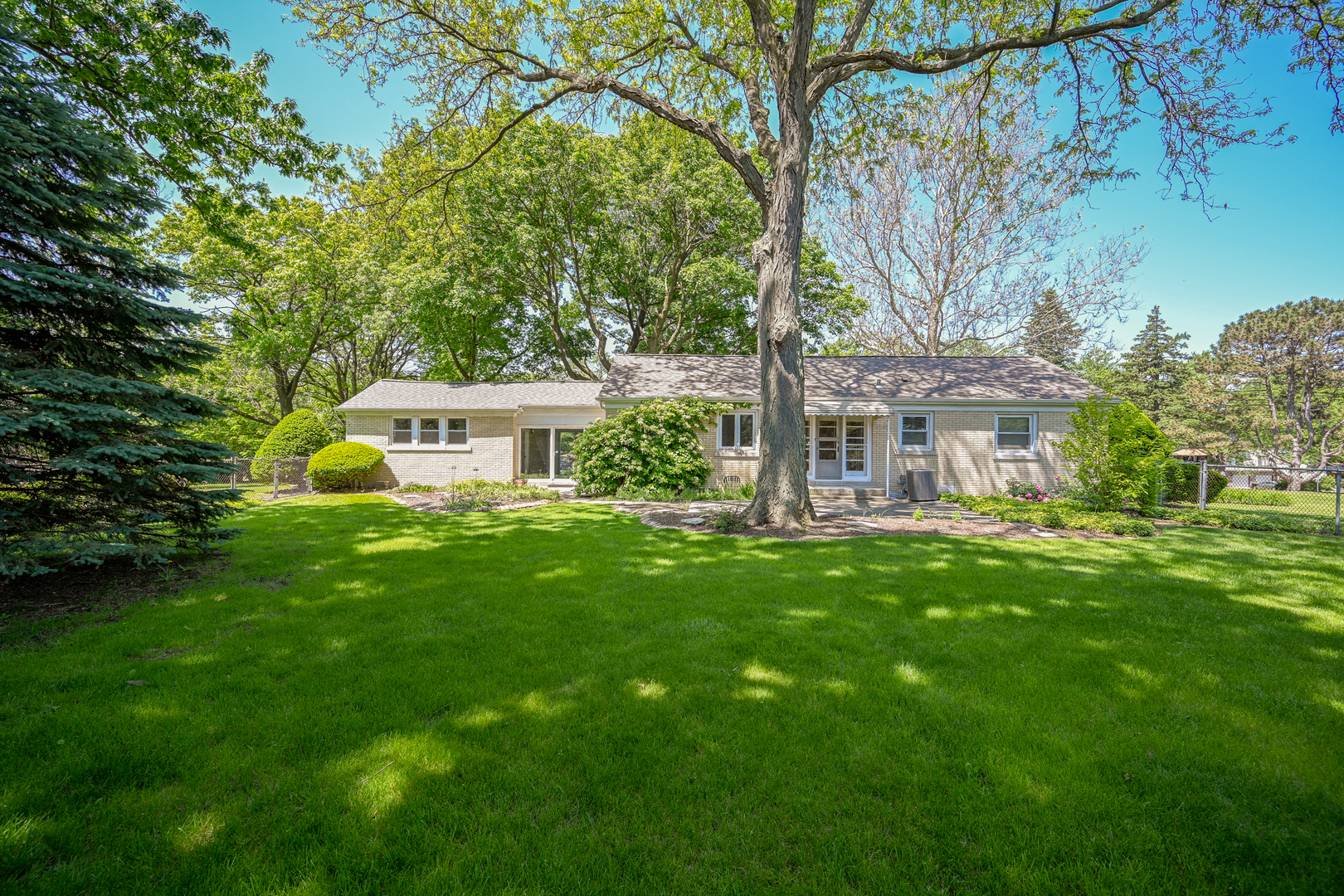 325 South Lambert Road Glen Ellyn, IL 60137 - Photo 31 of 32 a front view of a house with yard and green space