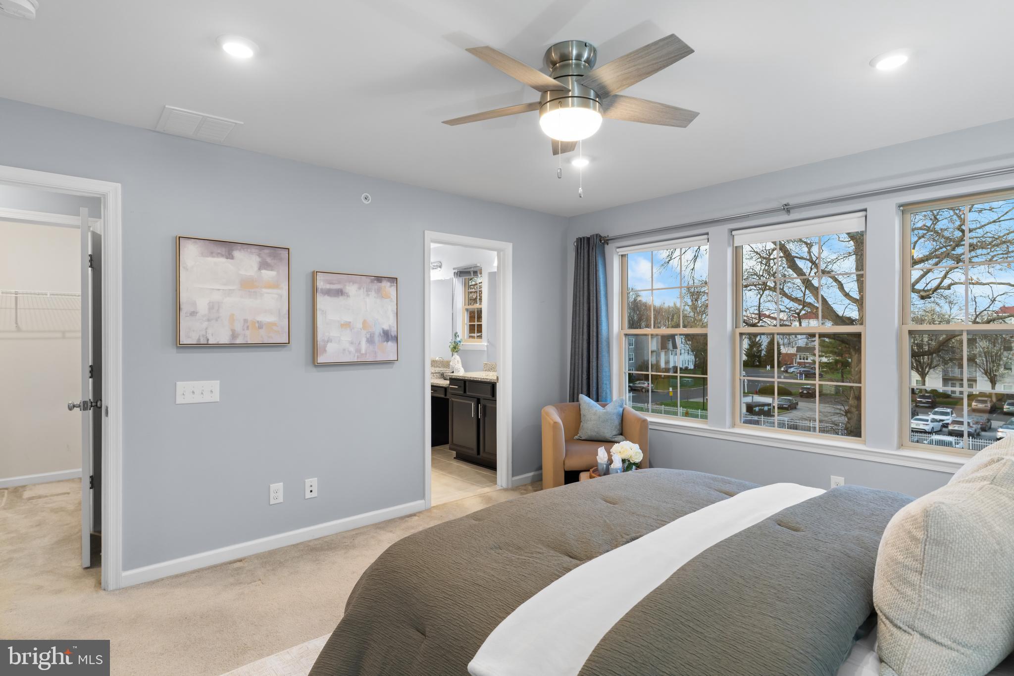 494 Rowan Street Warminster, PA 18974 - Photo 24 of 42 a bedroom with a large bed and a large window