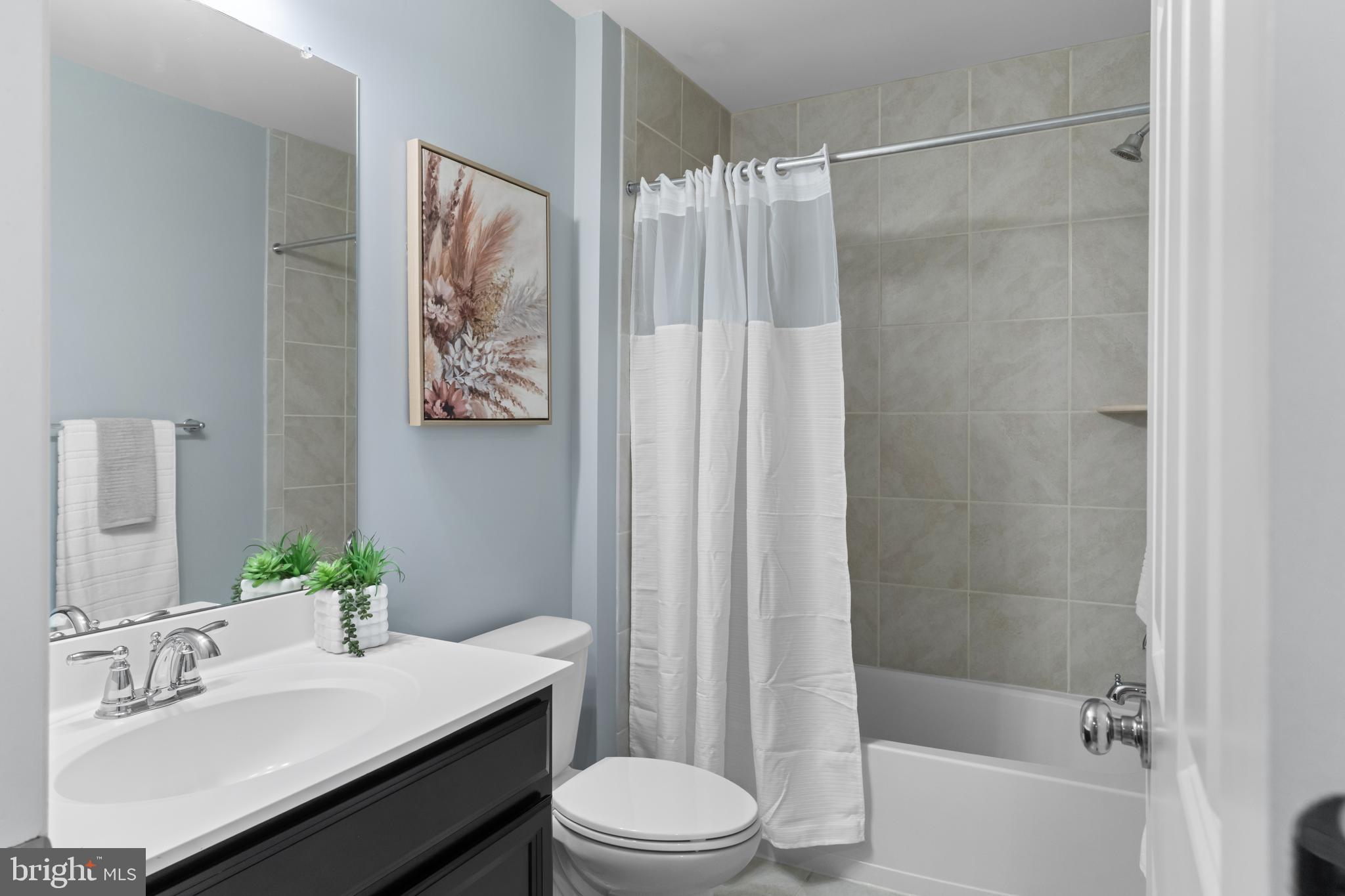 494 Rowan Street Warminster, PA 18974 - Photo 29 of 42 a bathroom with a sink toilet and shower