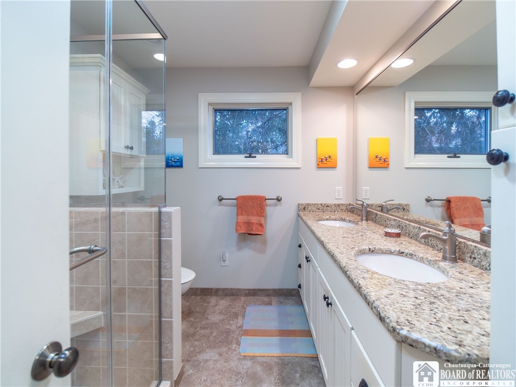 3605 Overlook Terrace Ellery, NY 14712 - Photo 26 of 40 The beautiful updated bathroom is conveniently loc