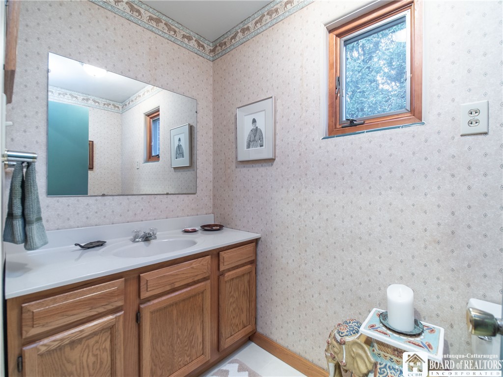 3605 Overlook Terrace Ellery, NY 14712 - Photo 9 of 40 The half bath is conveniently located right inside
