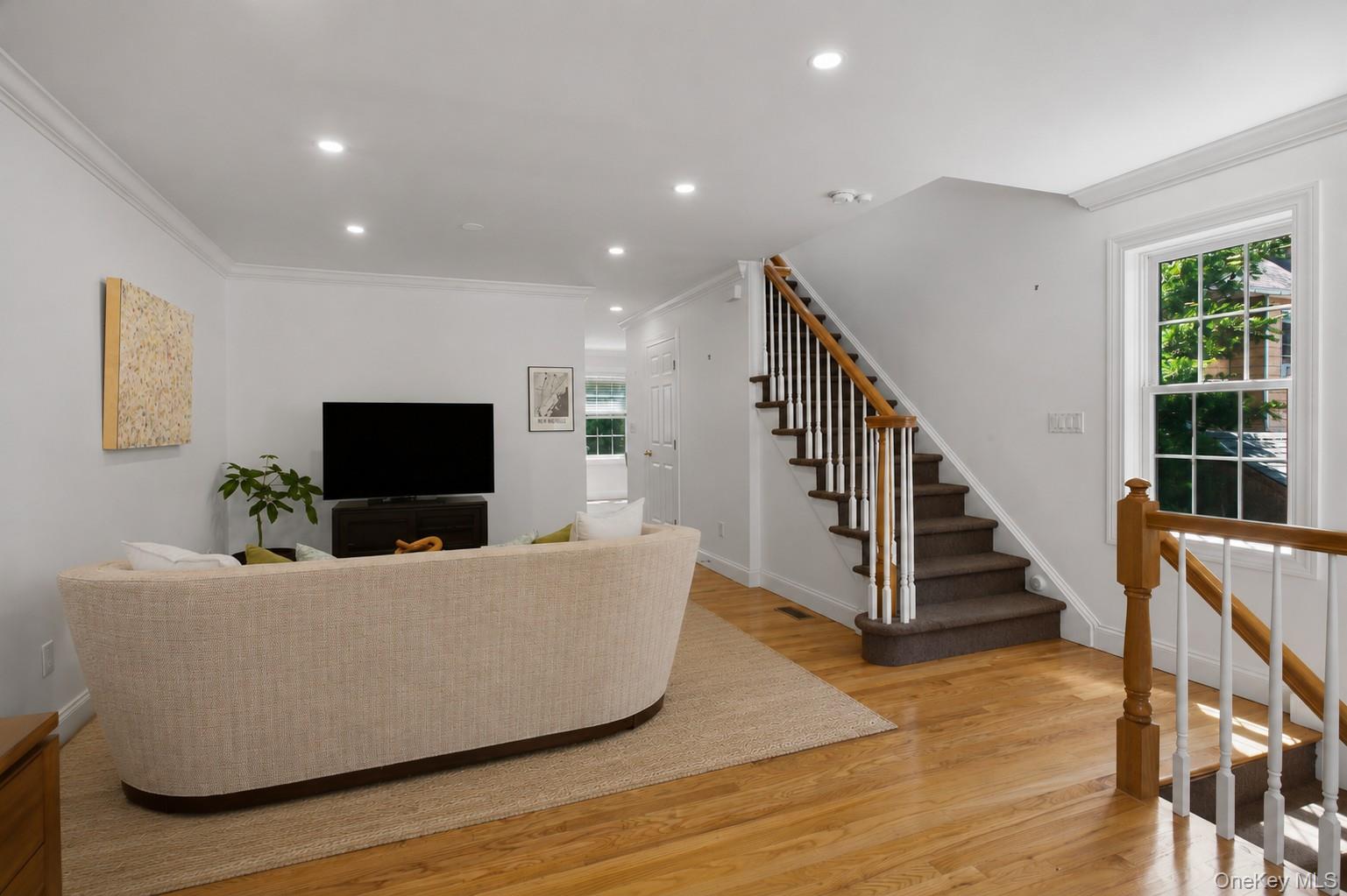 11 Prince Street, Unit C5 New Rochelle, NY 10801 - Photo 4 of 21 Expansive bright living space leading into kitchen for easy entertaining!