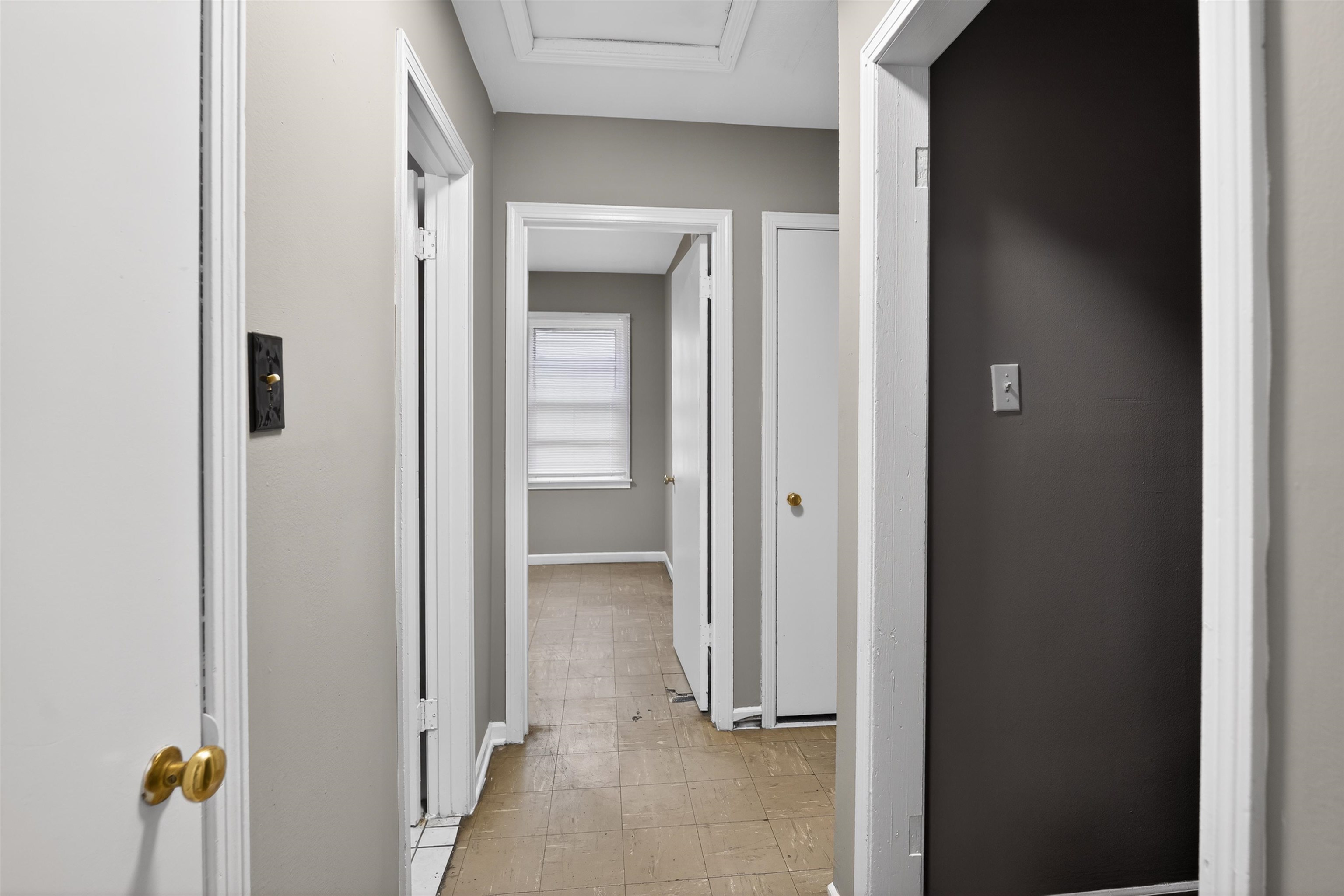 1422 Abernathy Road Memphis, TN 38116 - Photo 29 of 30 Hallway with light gray painted walls and white trim