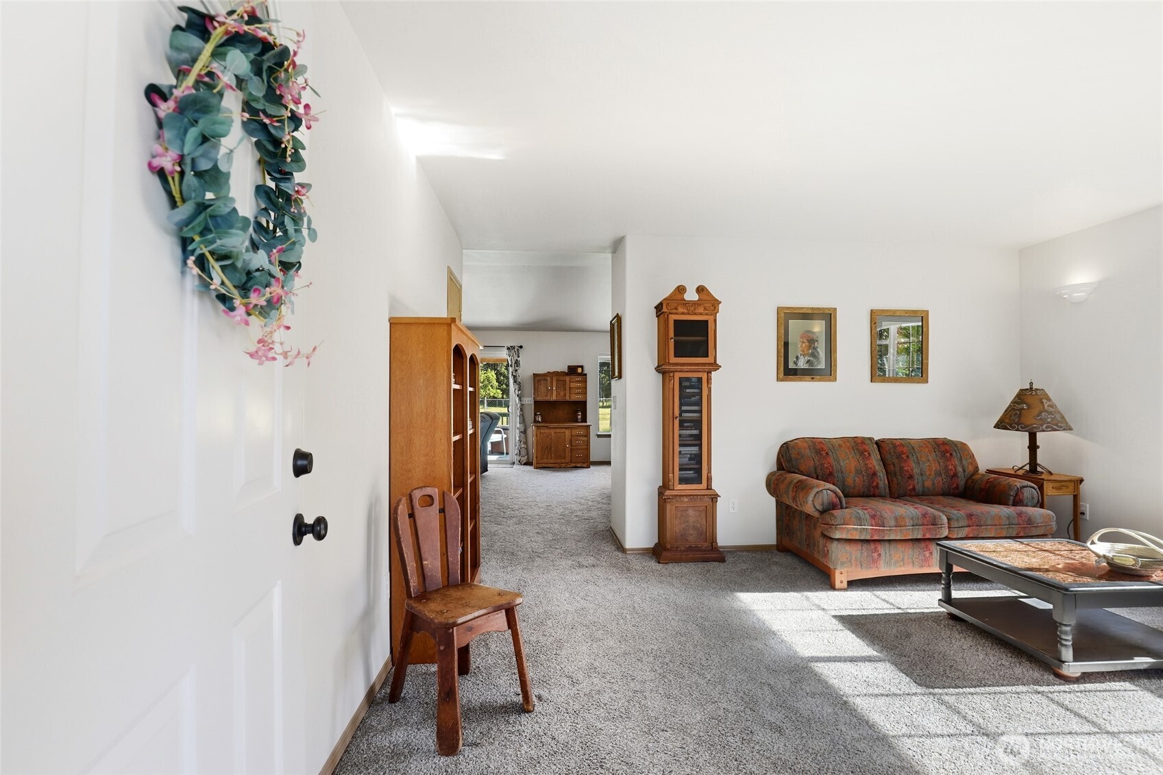 8008 188th Avenue Southwest Rochester, WA 98579 - Photo 7 of 40 a living room with furniture plant and a potted plant