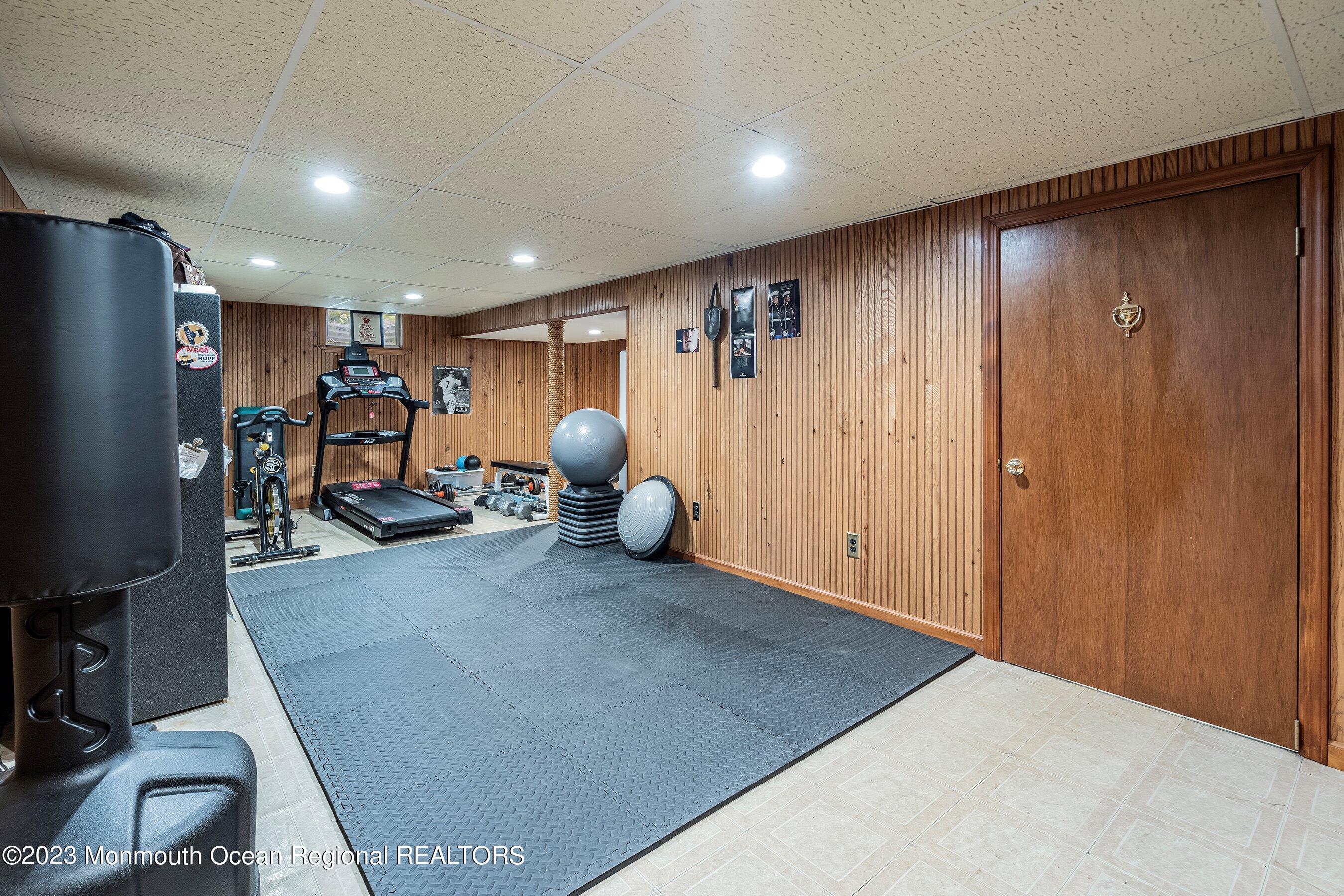 1 Hearth Court Howell, NJ 07731 - Photo 13 of 23 a room with furniture and a window