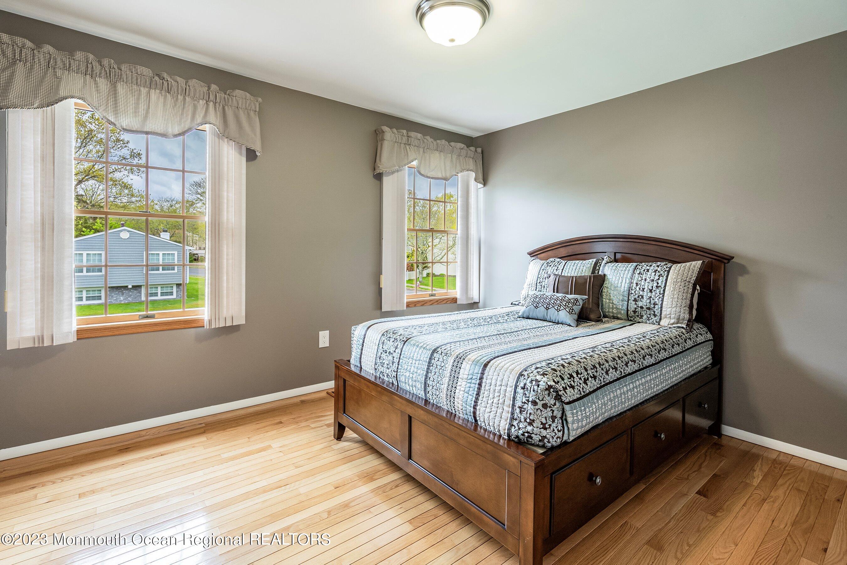 1 Hearth Court Howell, NJ 07731 - Photo 14 of 23 a bedroom with a bed and window