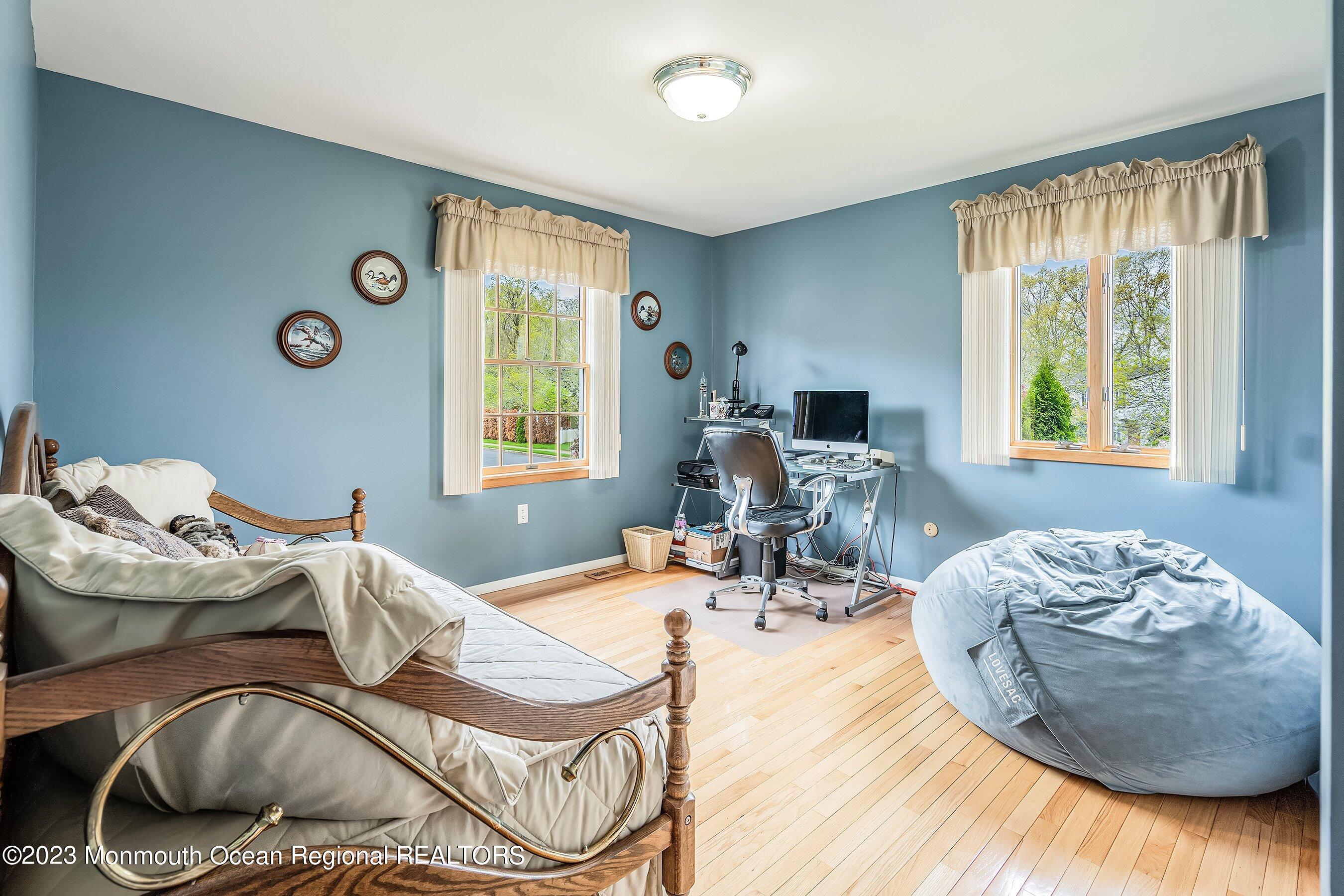 1 Hearth Court Howell, NJ 07731 - Photo 15 of 23 a living room with furniture and a window