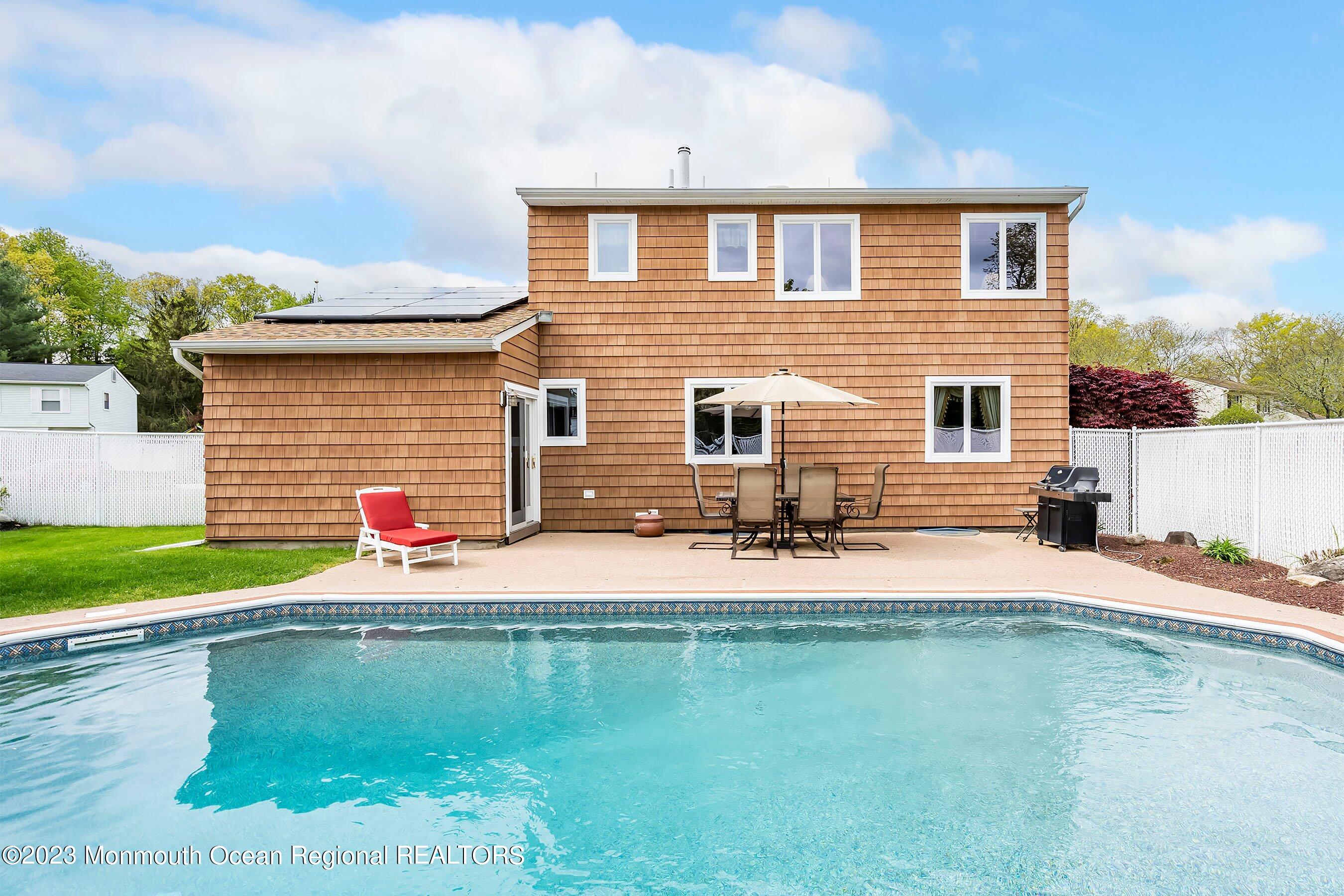 1 Hearth Court Howell, NJ 07731 - Photo 19 of 23 a house view with a backyard space