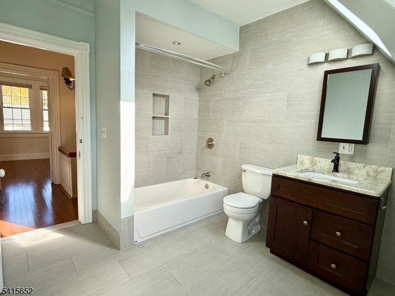 8 William Street Summit, NJ 07901 - Photo 17 of 17 a bathroom with a double vanity sink toilet mirror and bathtub
