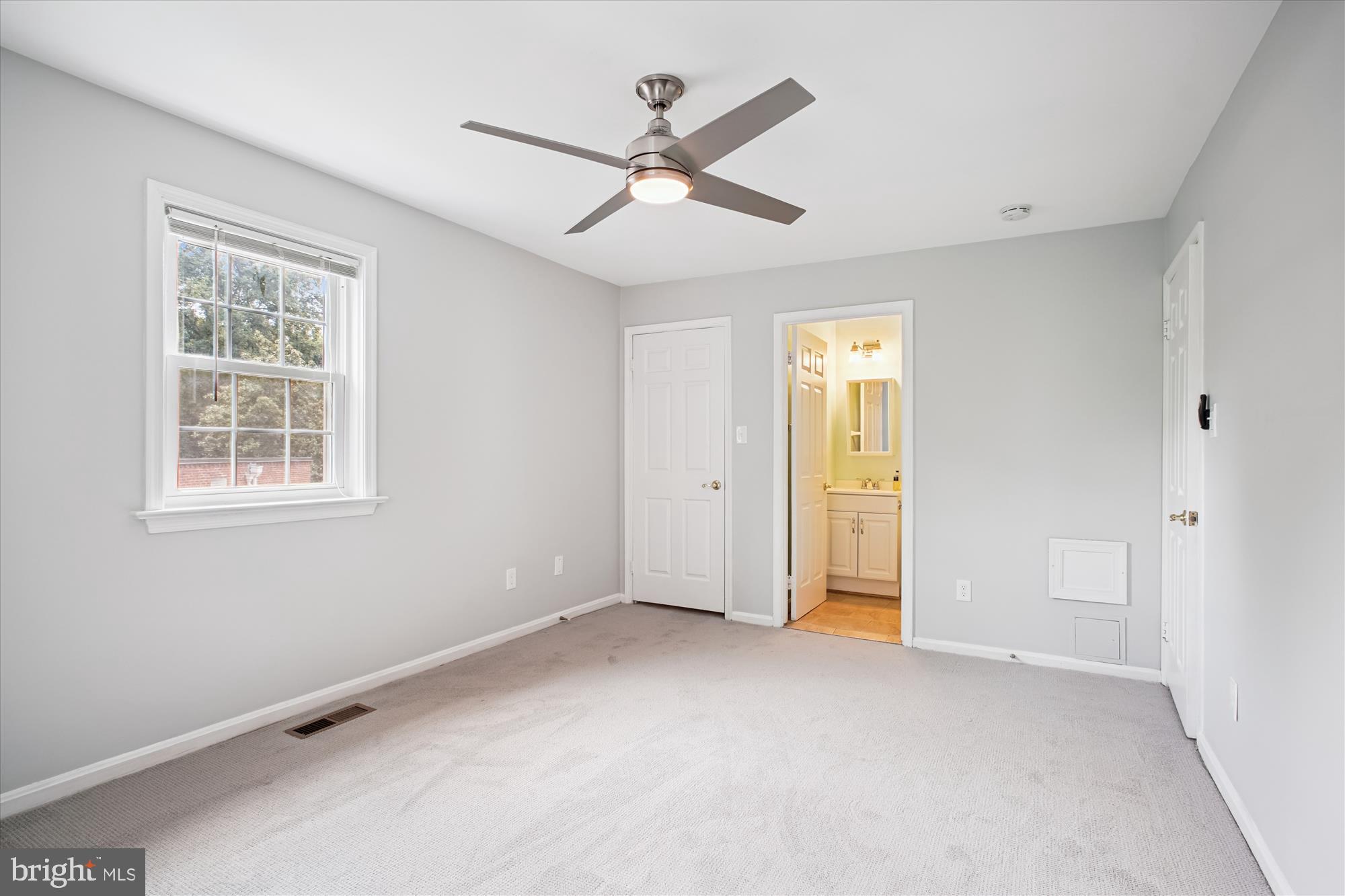 6709 Fairfax Road, Unit 72 Chevy Chase, MD 20815 - Photo 11 of 37 a view of an empty room with a window
