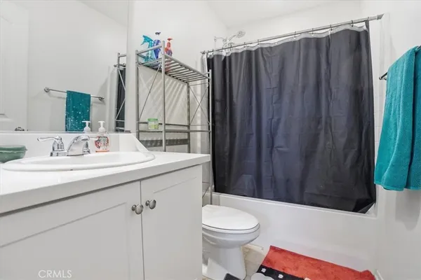 a livingroom with furniture and a window