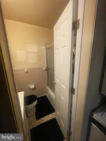 a bathroom with a sink and toilet