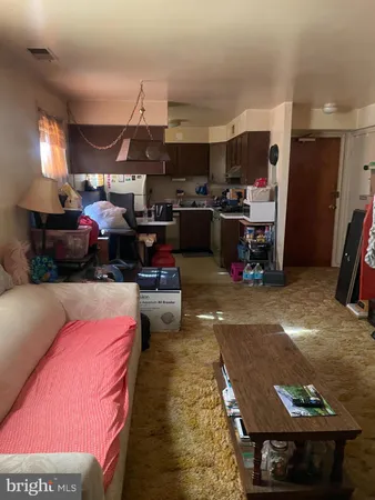 a view of a chairs and table in a room