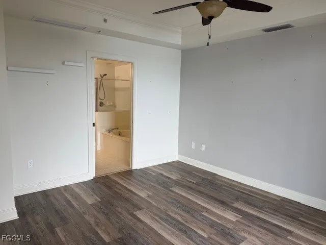 a view of a small space with wooden floor