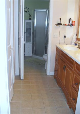 35 Lynbrook Road Methuen, MA 01844 - Photo 5 of 8 a bathroom with a sink and a mirror