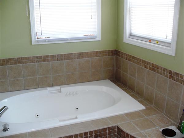 35 Lynbrook Road Methuen, MA 01844 - Photo 6 of 8 a view of a bathtub in a bathroom