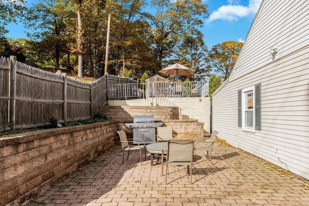 23 Appleton Street Saugus, MA 01906 - Photo 24 of 30 a view of a patio with a table and chairs