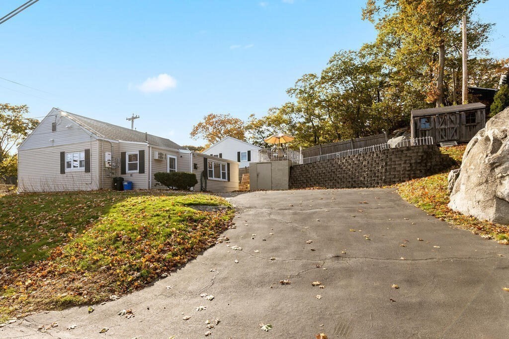 23 Appleton Street Saugus, MA 01906 - Photo 27 of 30 a front view of a house with a yard