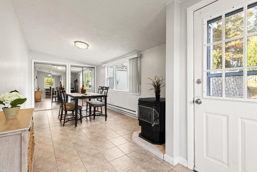 23 Appleton Street Saugus, MA 01906 - Photo 10 of 30 a view of a dining room with furniture and a potted plant