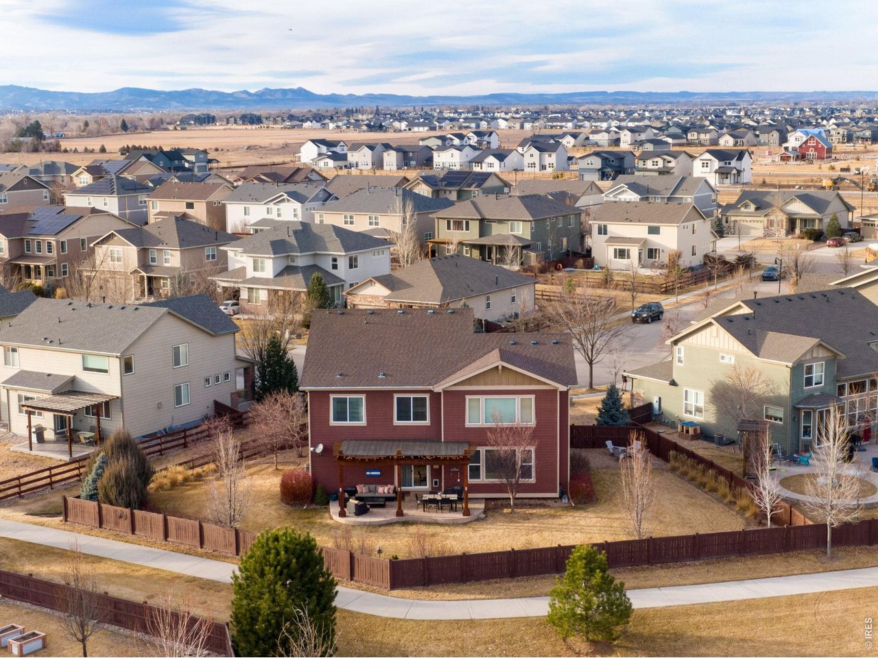 5728 Connor Street Timnath, CO 80547 - Photo 2 of 50 an aerial view of a building with lake view