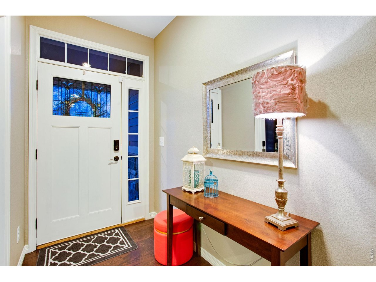5728 Connor Street Timnath, CO 80547 - Photo 5 of 50 a room with furniture and a table