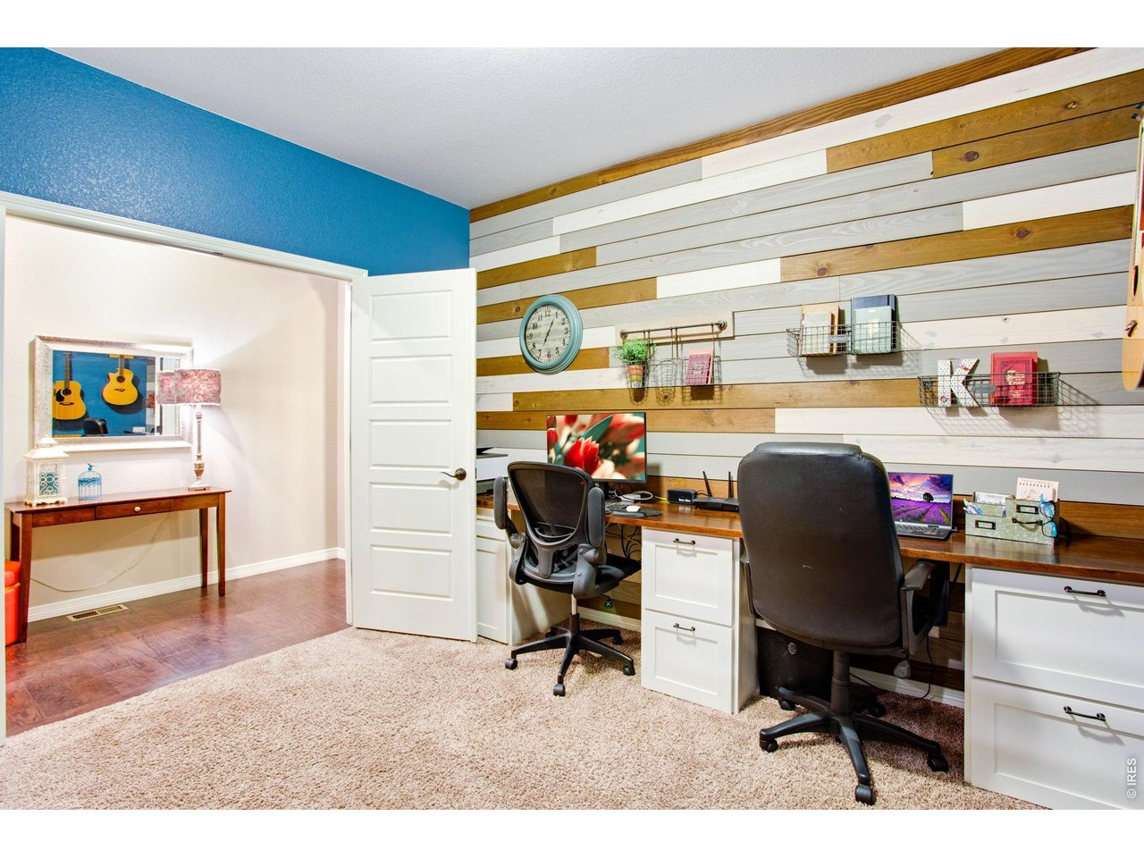 5728 Connor Street Timnath, CO 80547 - Photo 6 of 50 a workspace with furniture and a window