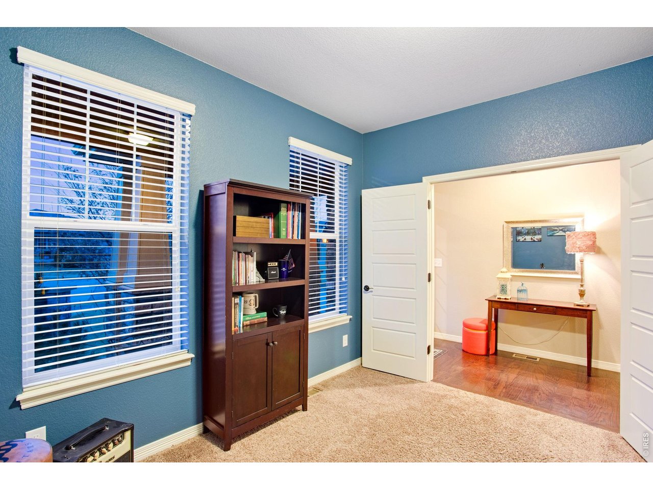 5728 Connor Street Timnath, CO 80547 - Photo 7 of 50 a living room with furniture and a window