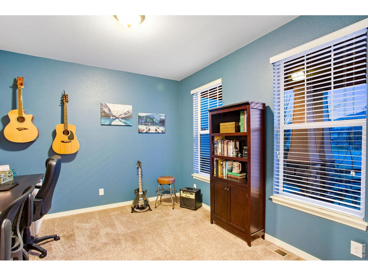 5728 Connor Street Timnath, CO 80547 - Photo 8 of 50 a room with painting and a table