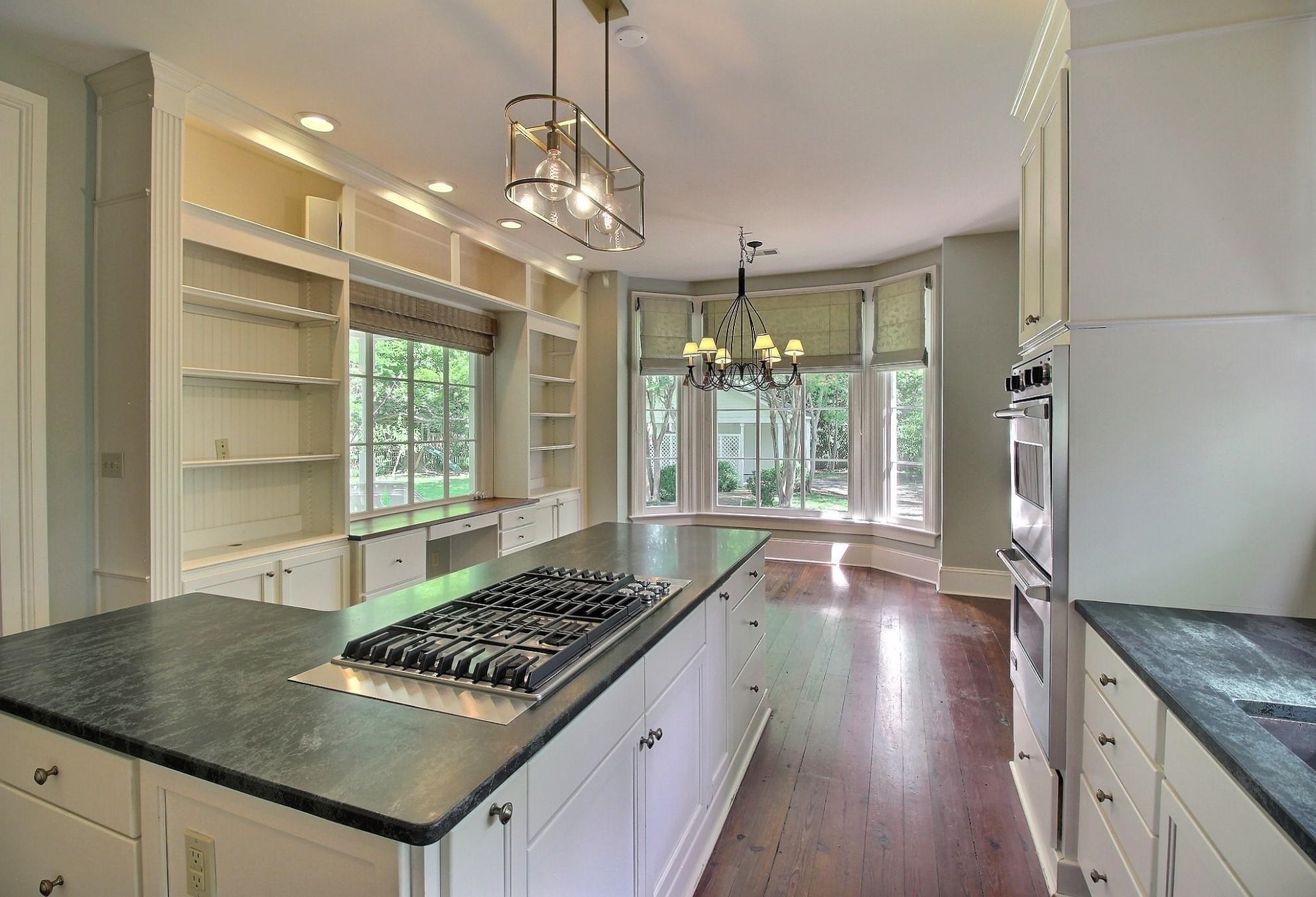 348 North Rowlett Street Collierville, TN 38017 - Photo 14 of 39 a kitchen with sink stove and refrigerator