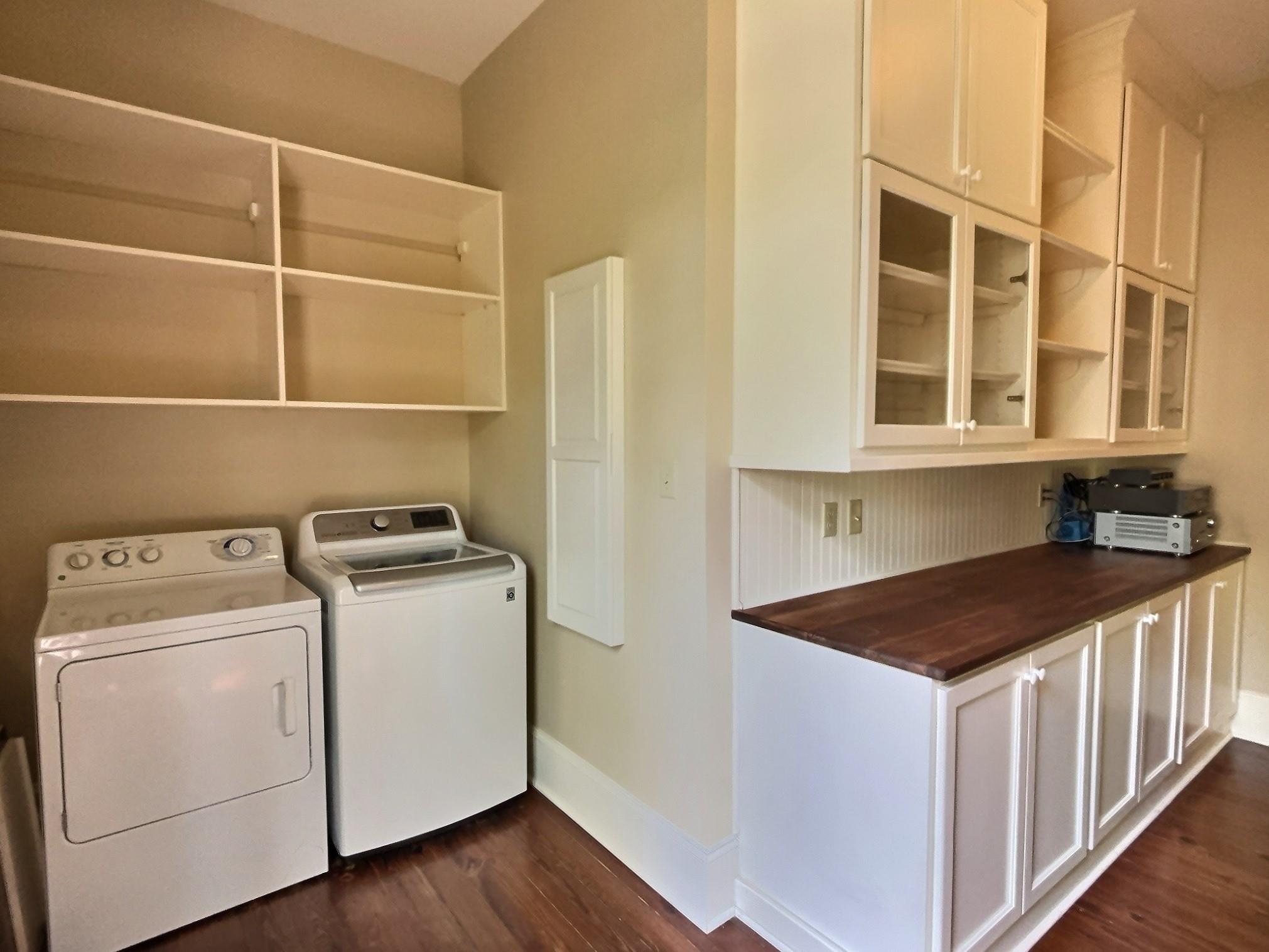 348 North Rowlett Street Collierville, TN 38017 - Photo 18 of 39 a utility room with dryer and washer
