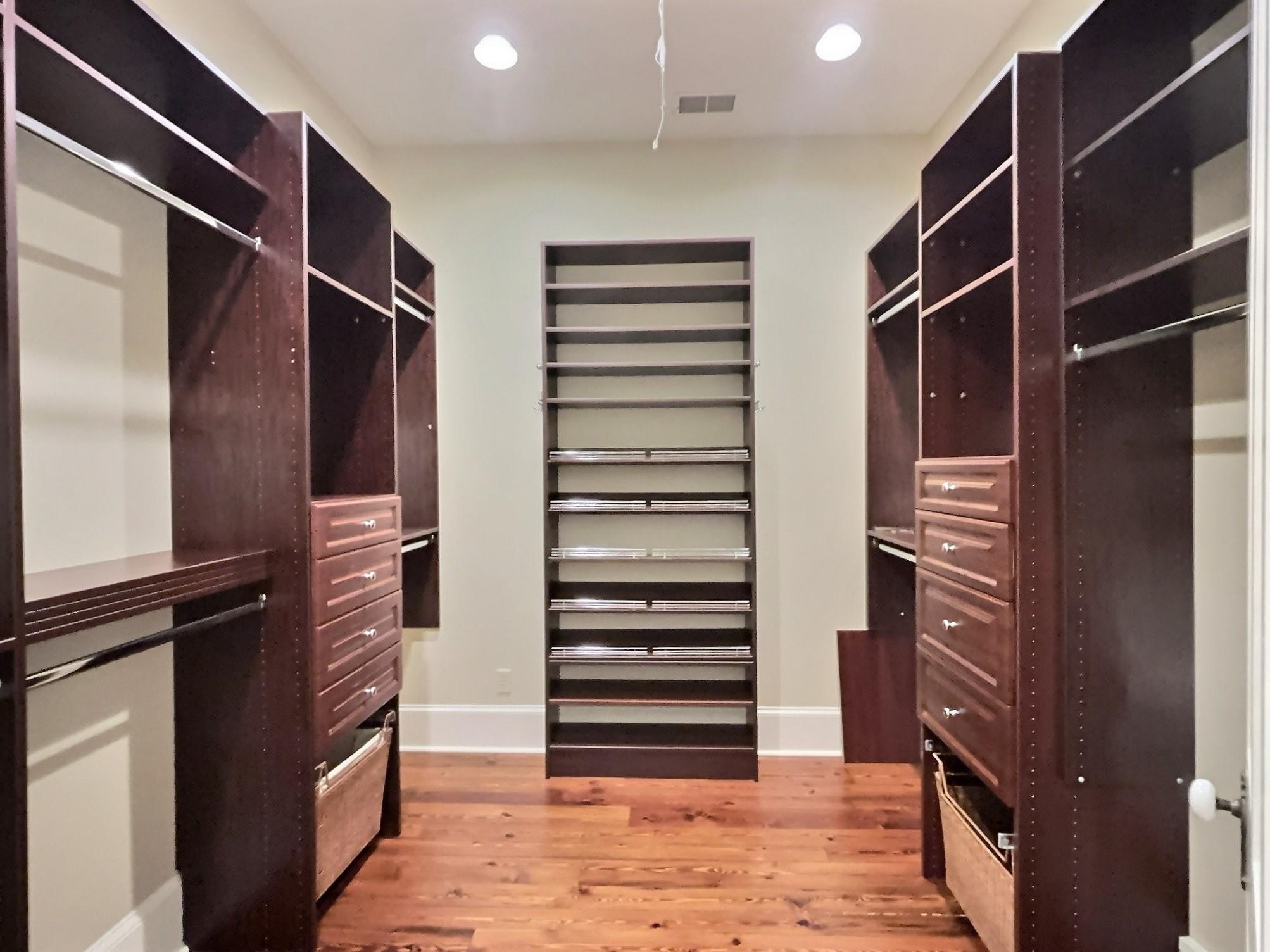 348 North Rowlett Street Collierville, TN 38017 - Photo 26 of 39 a view of walk in closet and stairs
