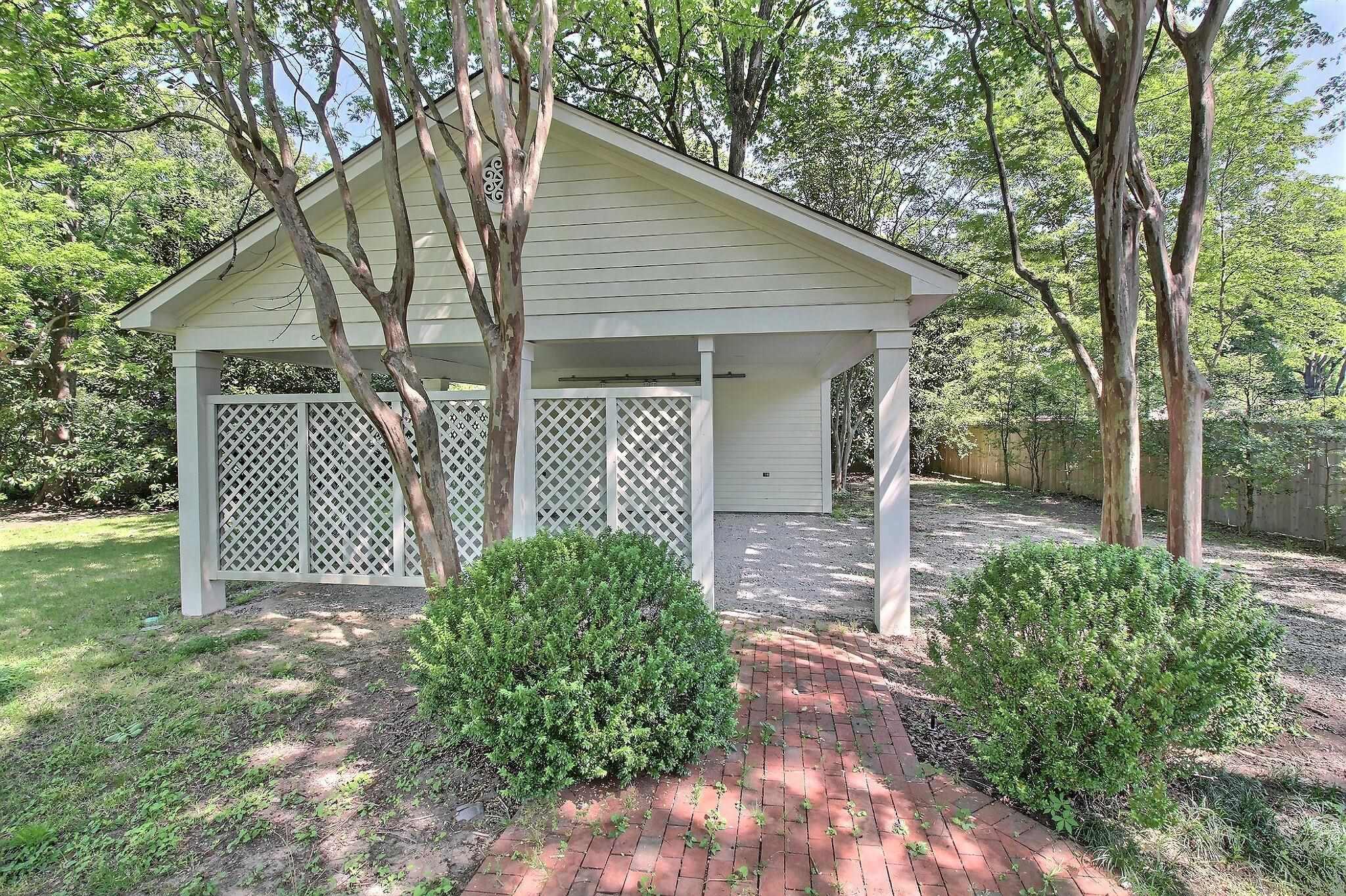 348 North Rowlett Street Collierville, TN 38017 - Photo 35 of 39 a front view of a house with garden