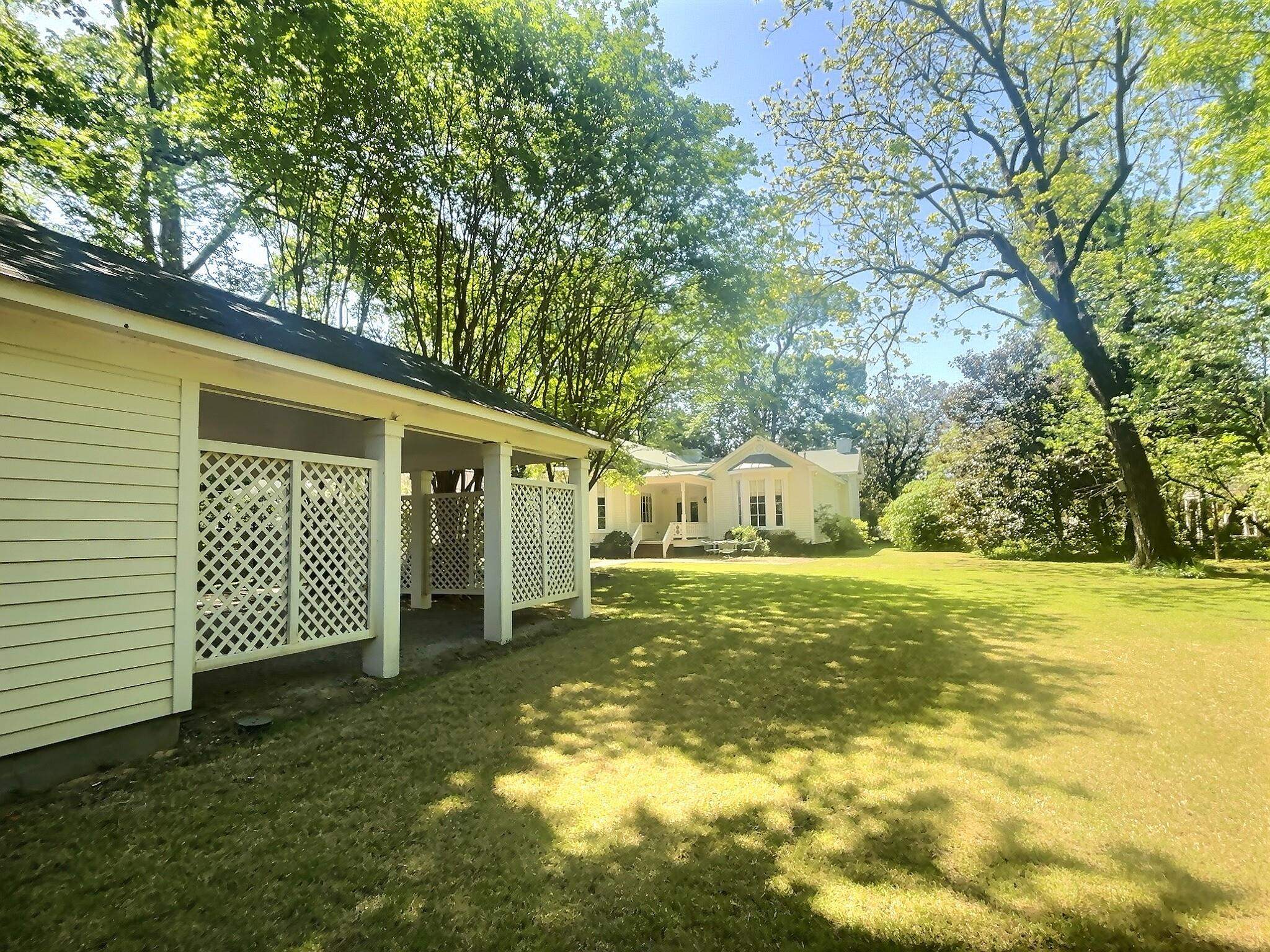 348 North Rowlett Street Collierville, TN 38017 - Photo 37 of 39 a view of a house with a yard