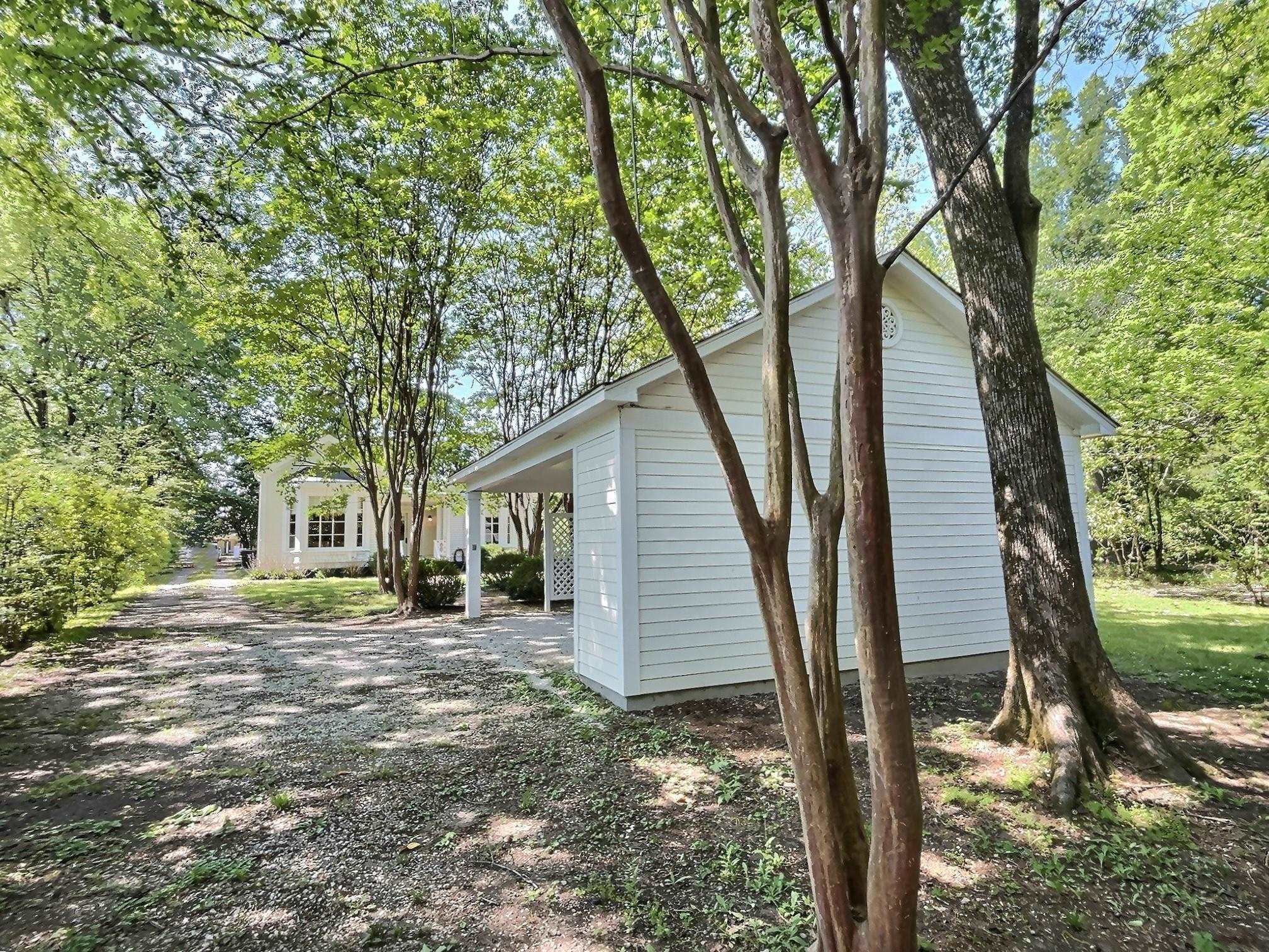 348 North Rowlett Street Collierville, TN 38017 - Photo 38 of 39 a house view with a backyard space